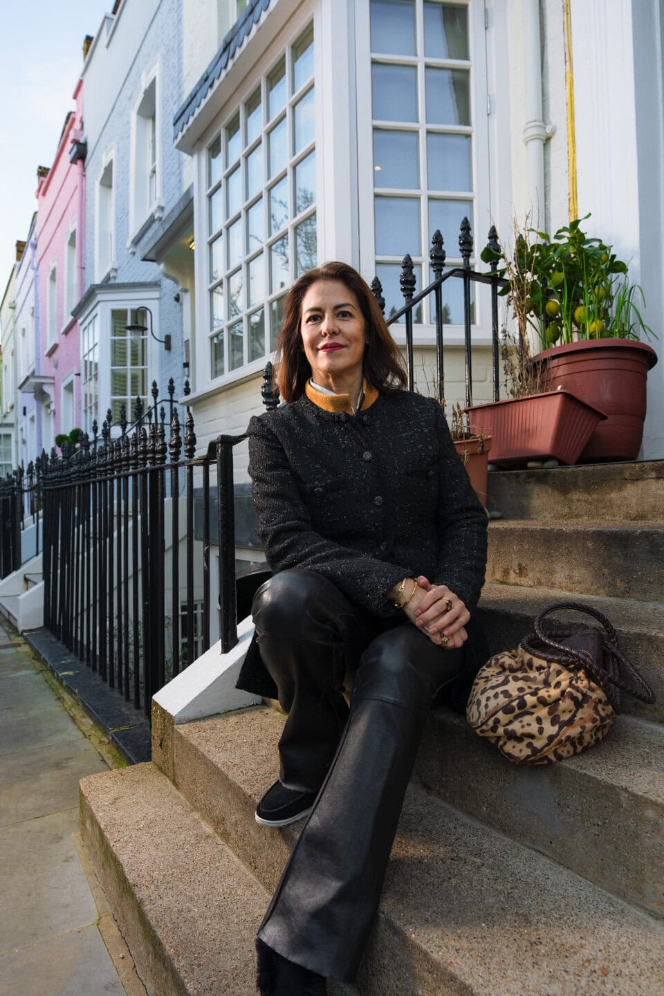 On-location lifestyle portrait of a woman in a bright interior