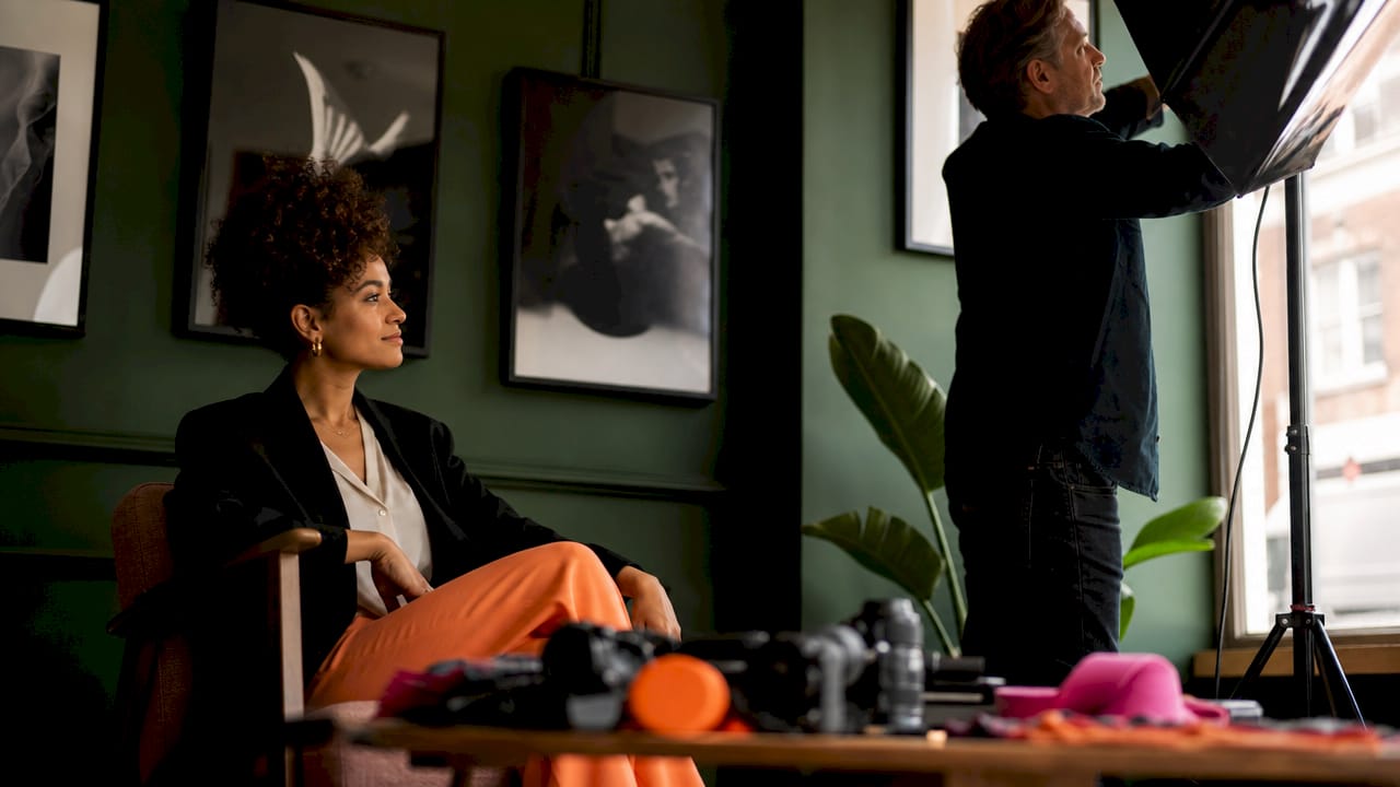 Professional woman preparing for photo shoot in London studio